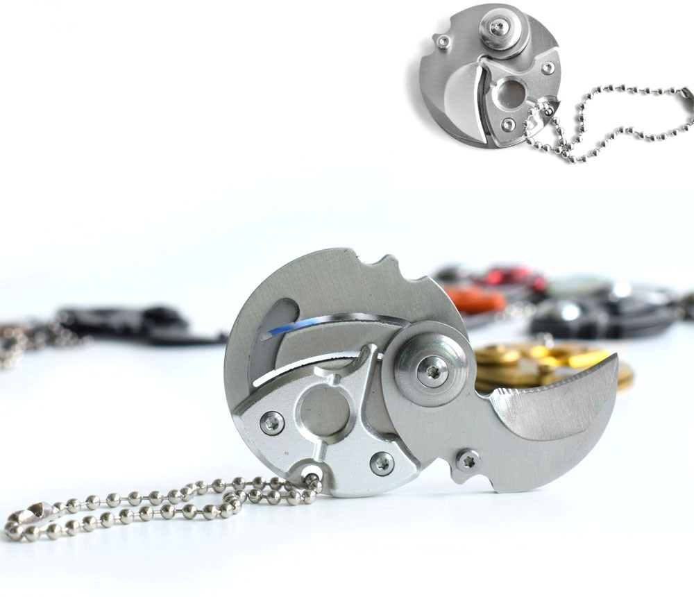 картинка Брелок мини - нож Коготь складывающийся круглый, цвет серебро 